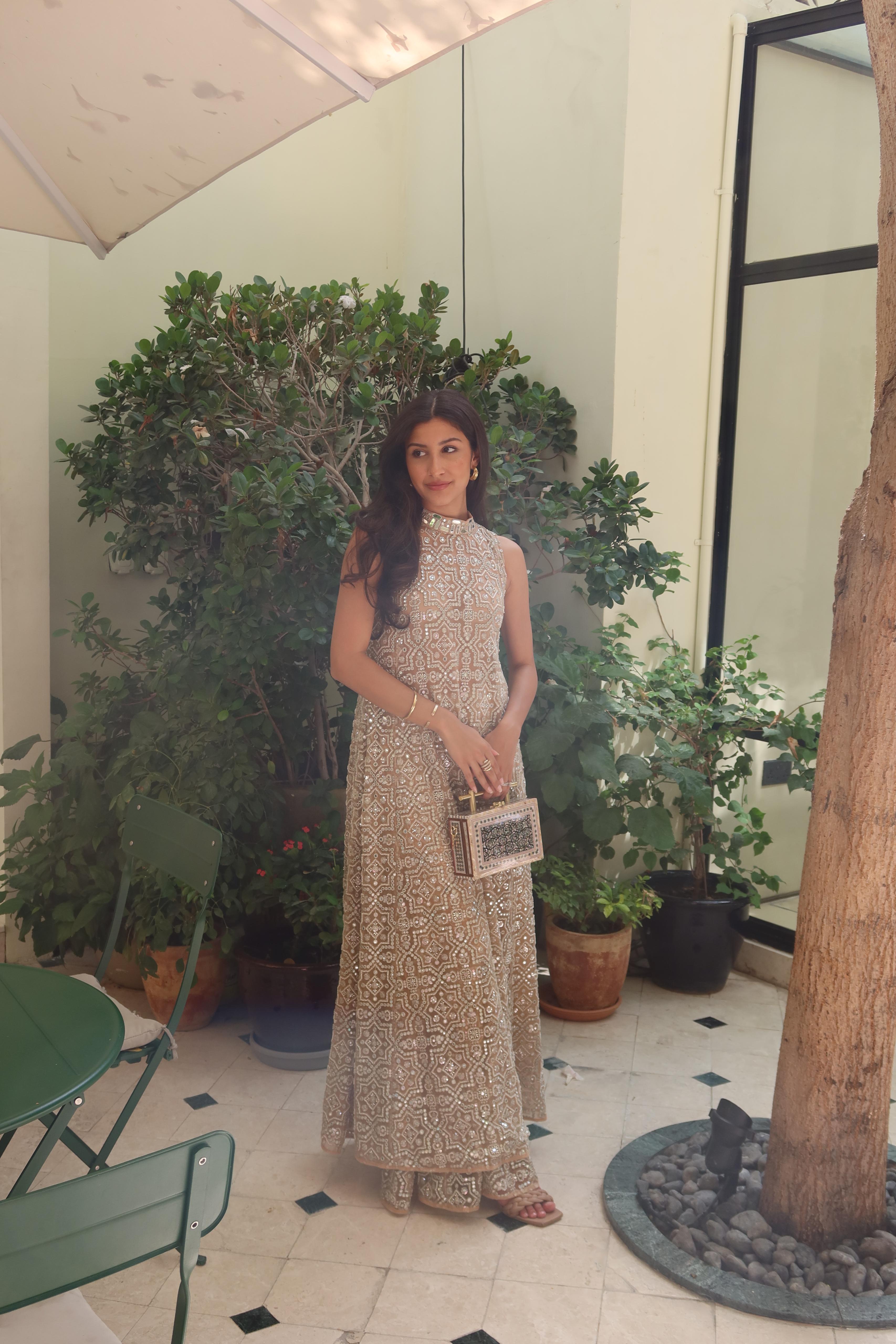 Afshaan in our Hi Neck Long Sleeveless Dress and Sharara Set