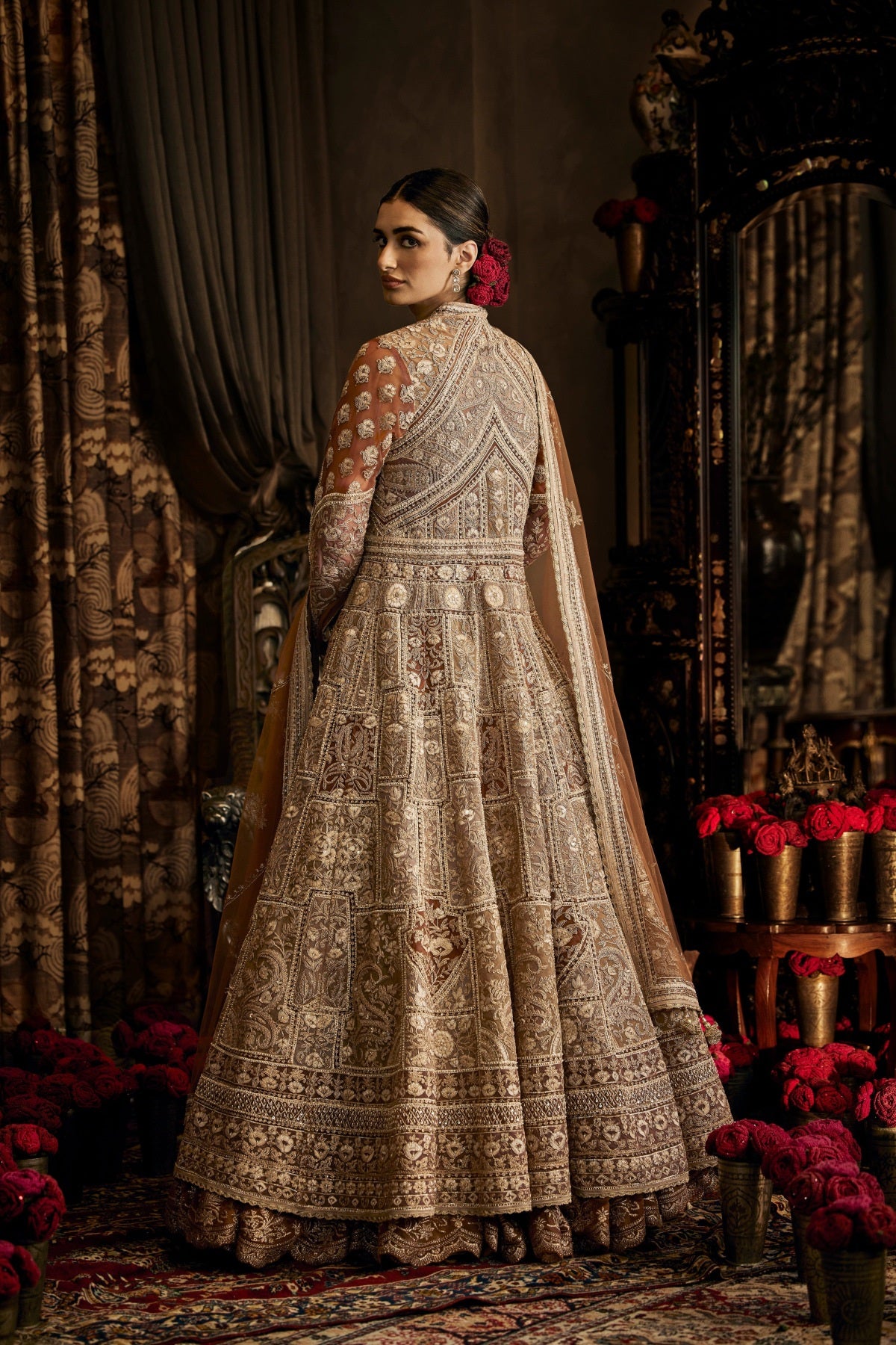 A beige Tulle Kalidar Jacket Skirt