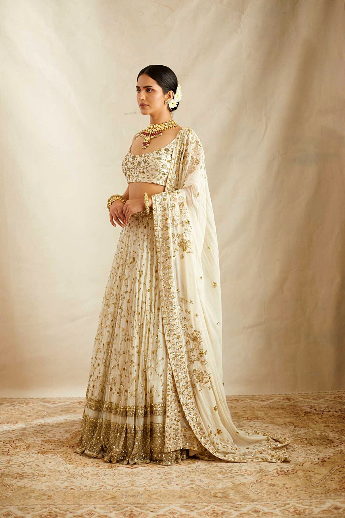 Off White Heavy Jaal Work Lehenga Set