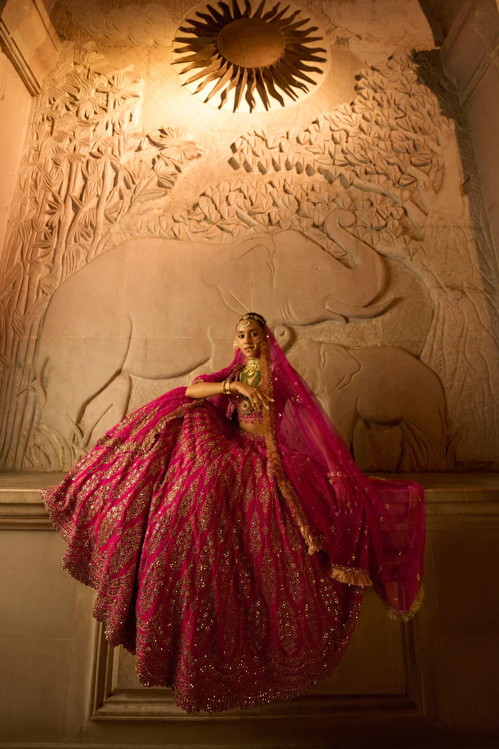 FUCHSIA RED RAW SILK BRIDAL LEHENGA CHOLI WITH A TULLE DUPATTA