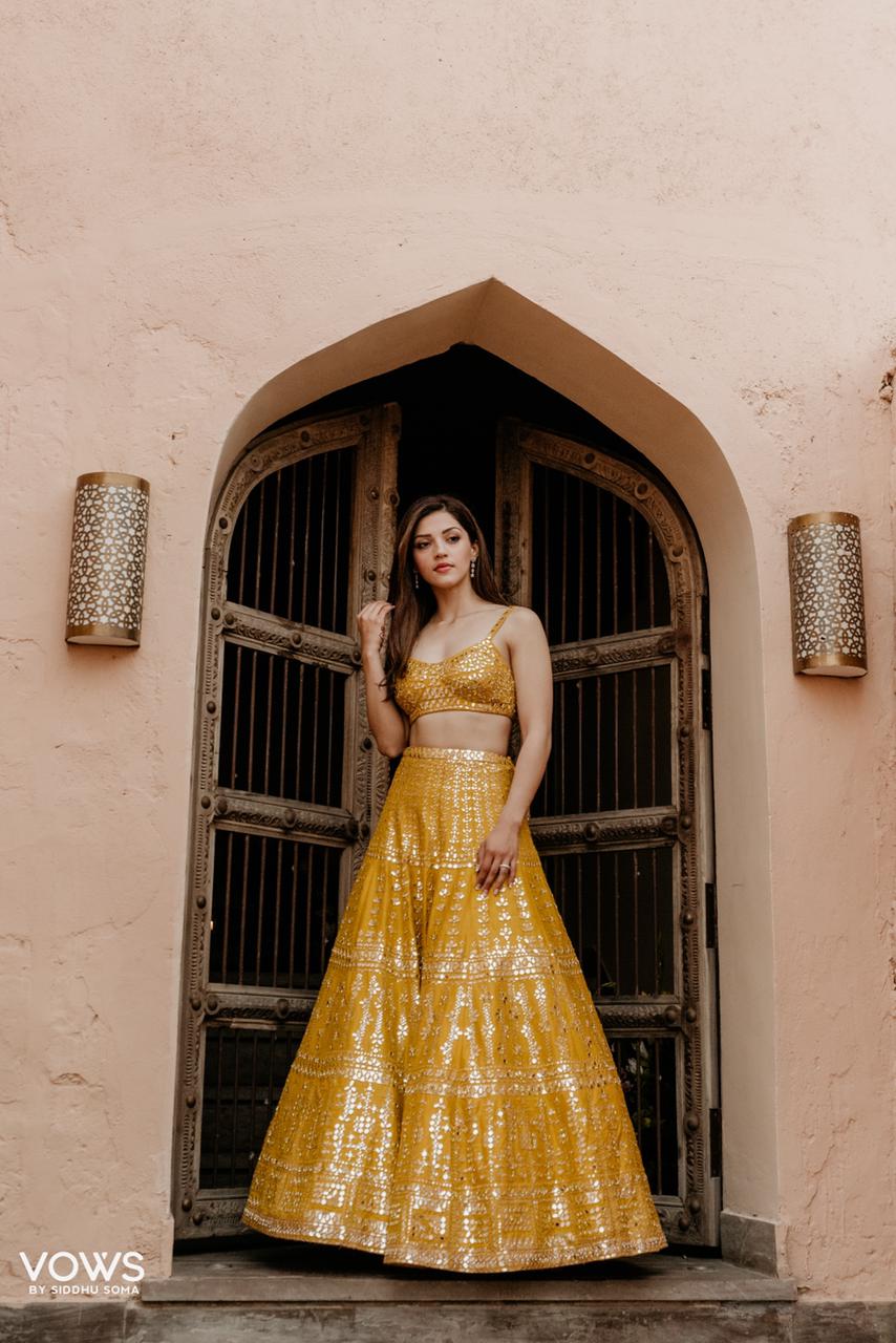 Mehreen Kaur Pirzada In Sunflower Yellow Mirror Work Lehenga Set