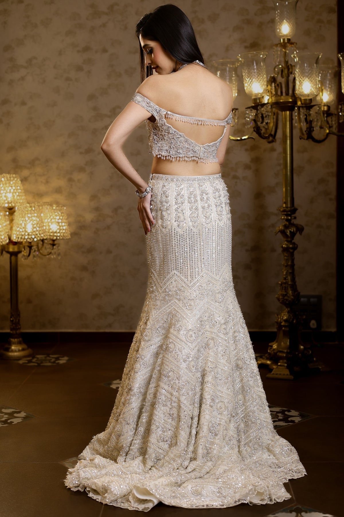 Ivory Net Hand Embroidered Fish-Cut Lehenga Set