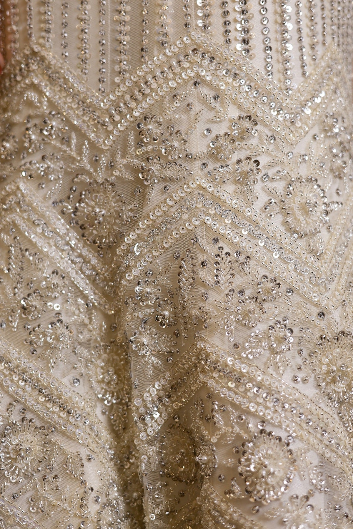 Ivory Net Hand Embroidered Fish-Cut Lehenga Set