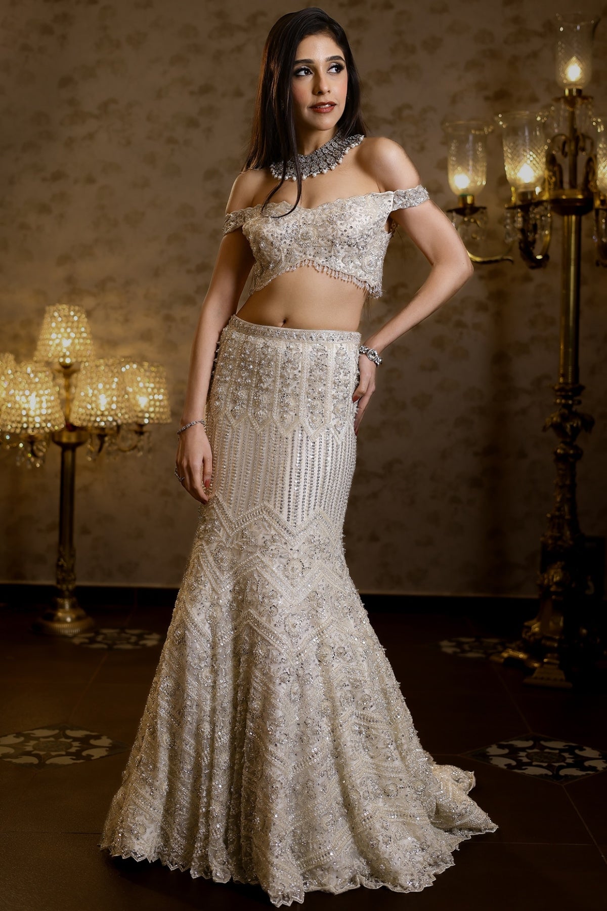 Ivory Net Hand Embroidered Fish-Cut Lehenga Set