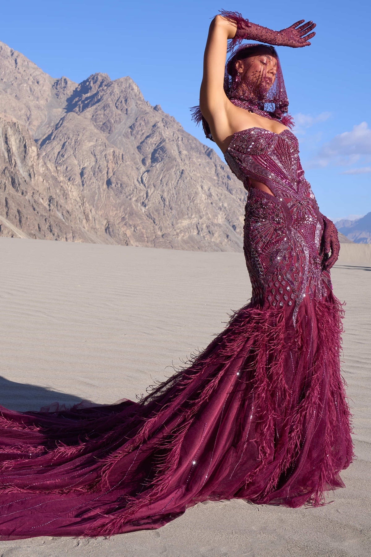 Wine Mermaid Feather Trail Gown With Embroidered Gloves And Veil