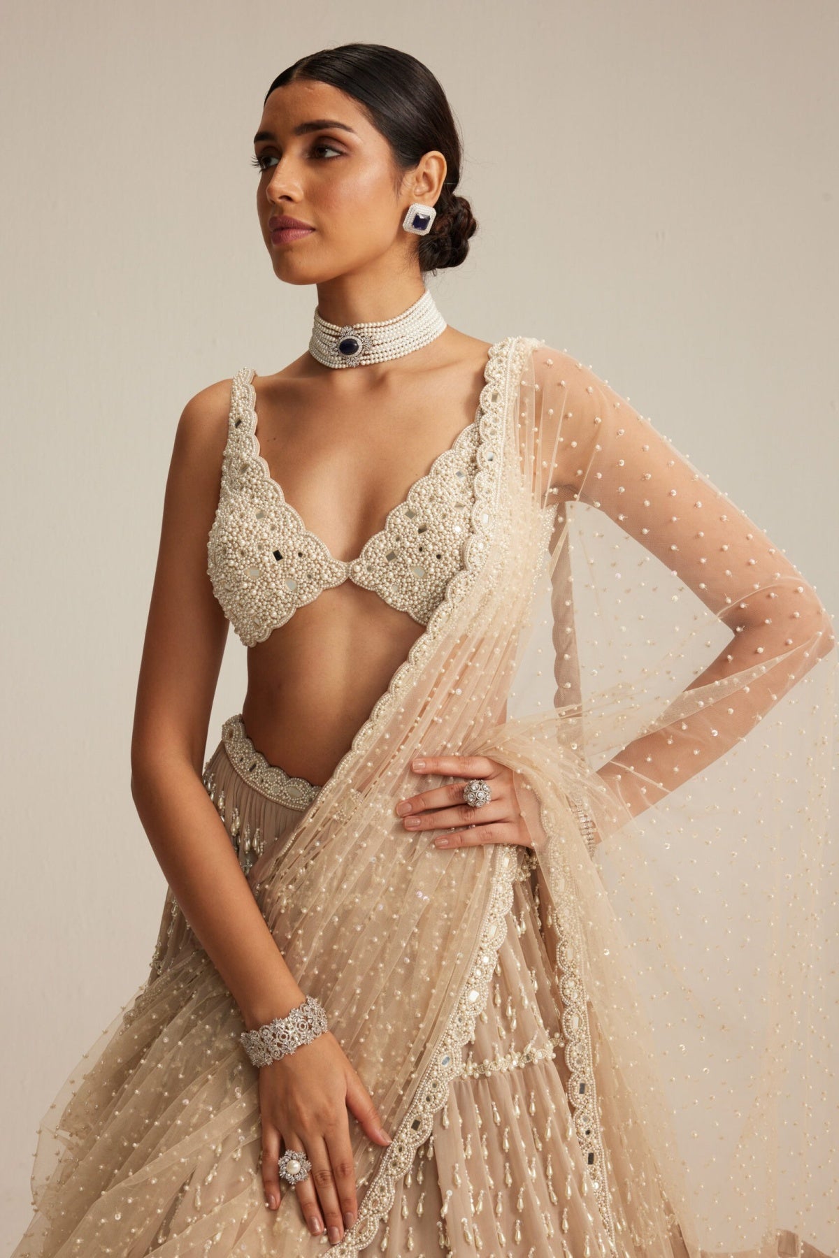 Light Beige Pearl Drop Multitier Lehenga with V neck Blouse