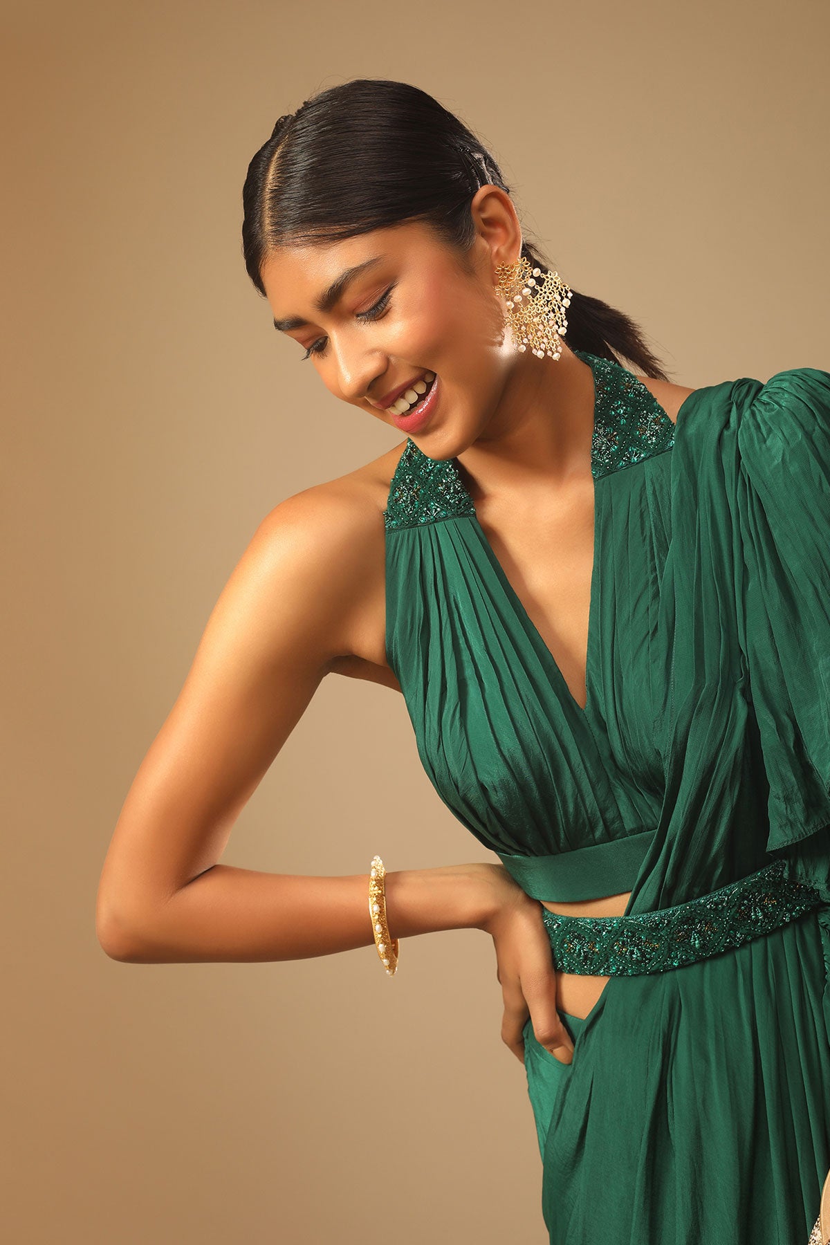 Emerald Green Ready Pleated Ruffle Saree With A Halter Neck Blouse And 3D Embroidered Belt