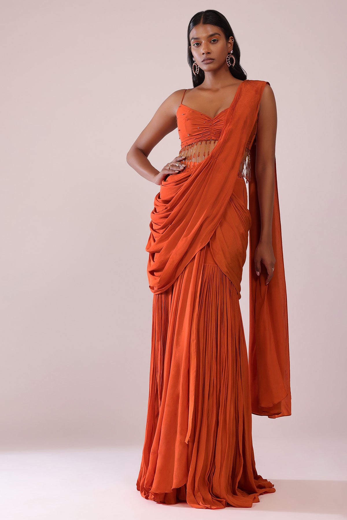 Orange Crepe Drape Saree And Blouse With Crystal Tassels All Over