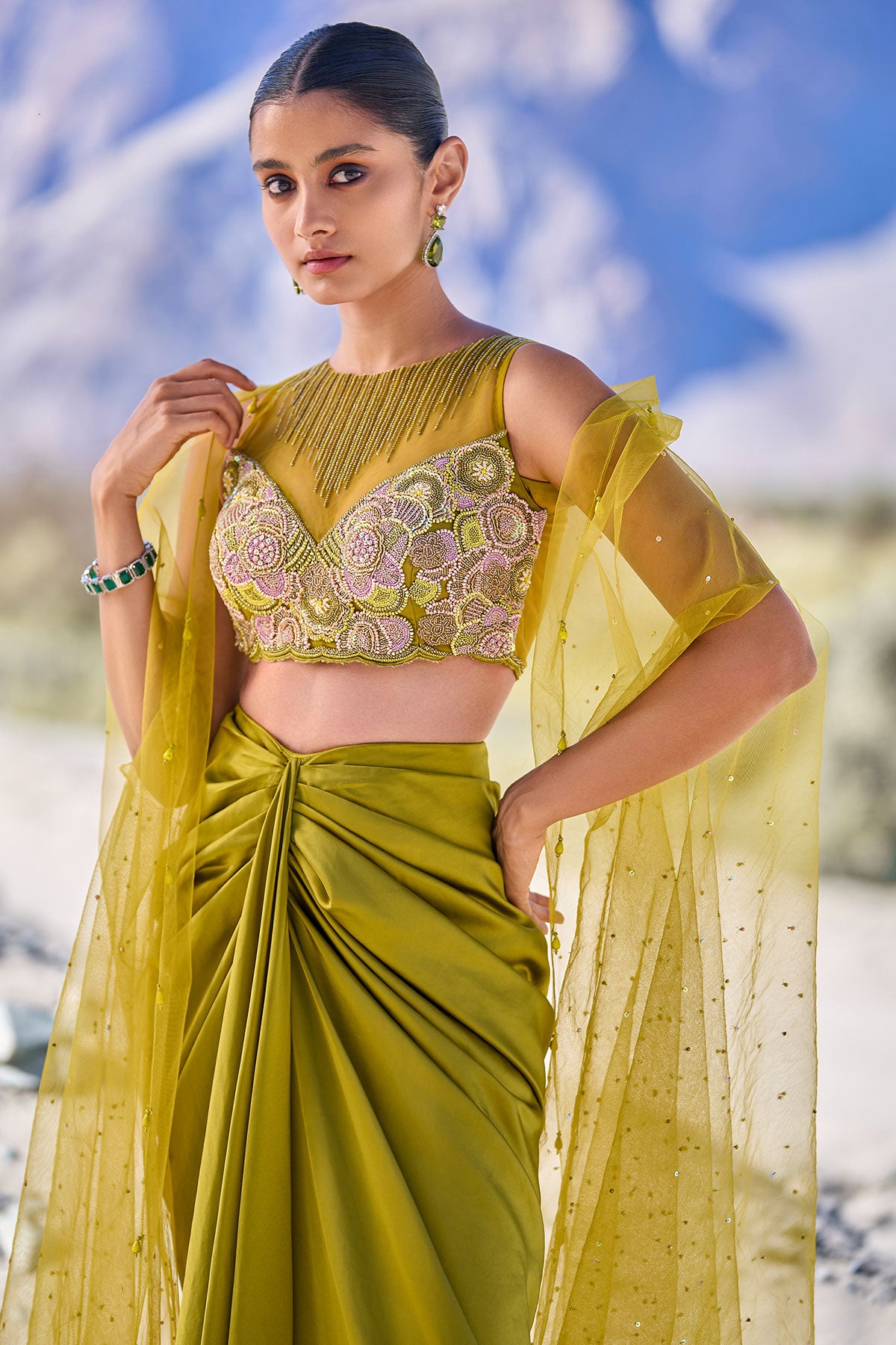 Green Satin Drape Skirt With Embroidered Blouse And Net Cape