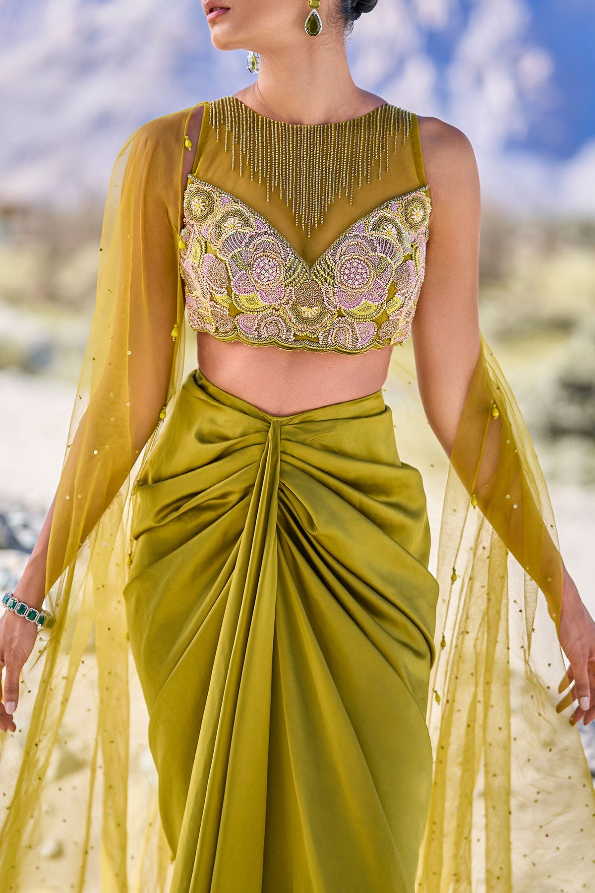 Green Satin Drape Skirt With Embroidered Blouse And Net Cape