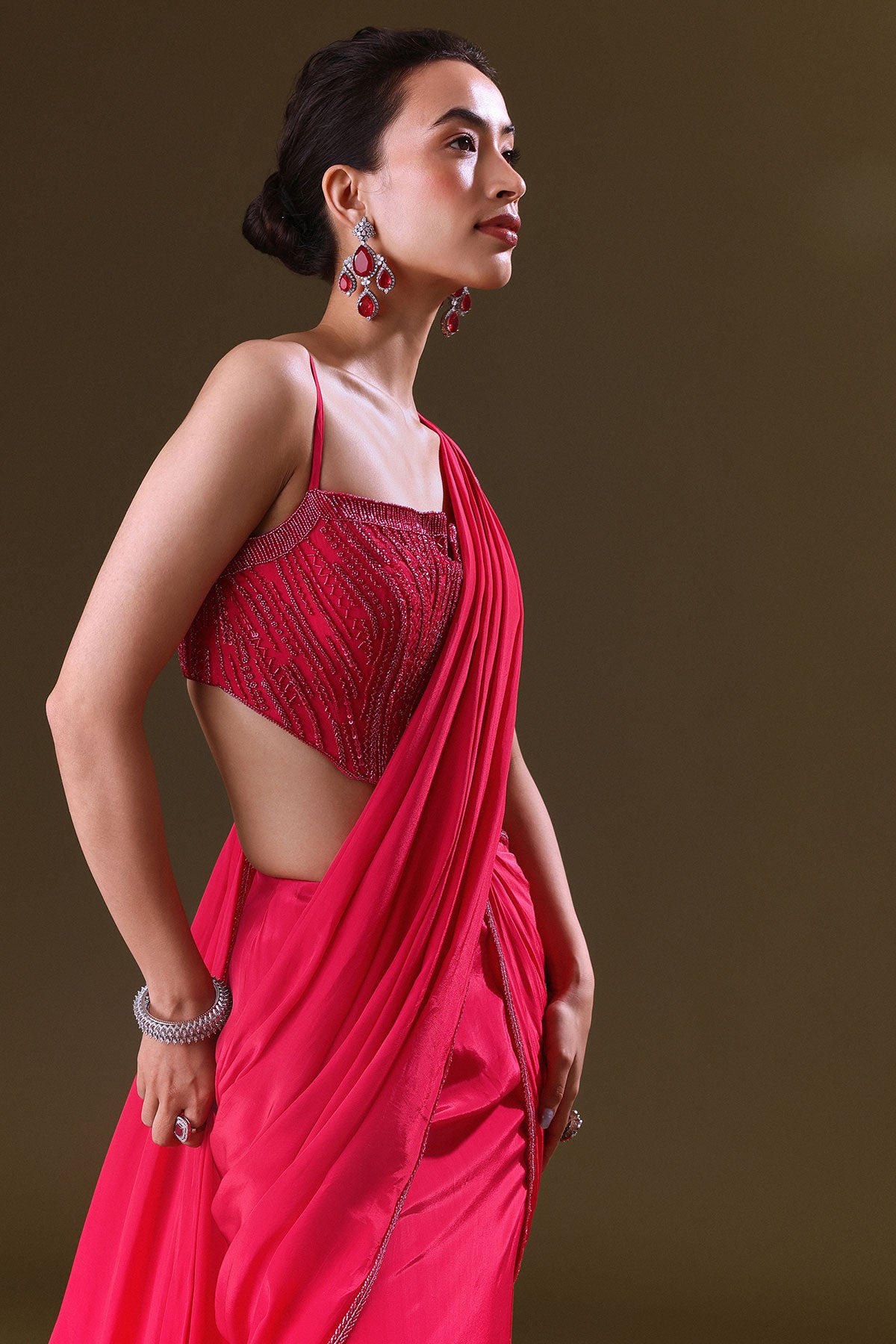 Reddish Pink Pre Stitched Draped Saree With Corset Fit Embroidered Blouse