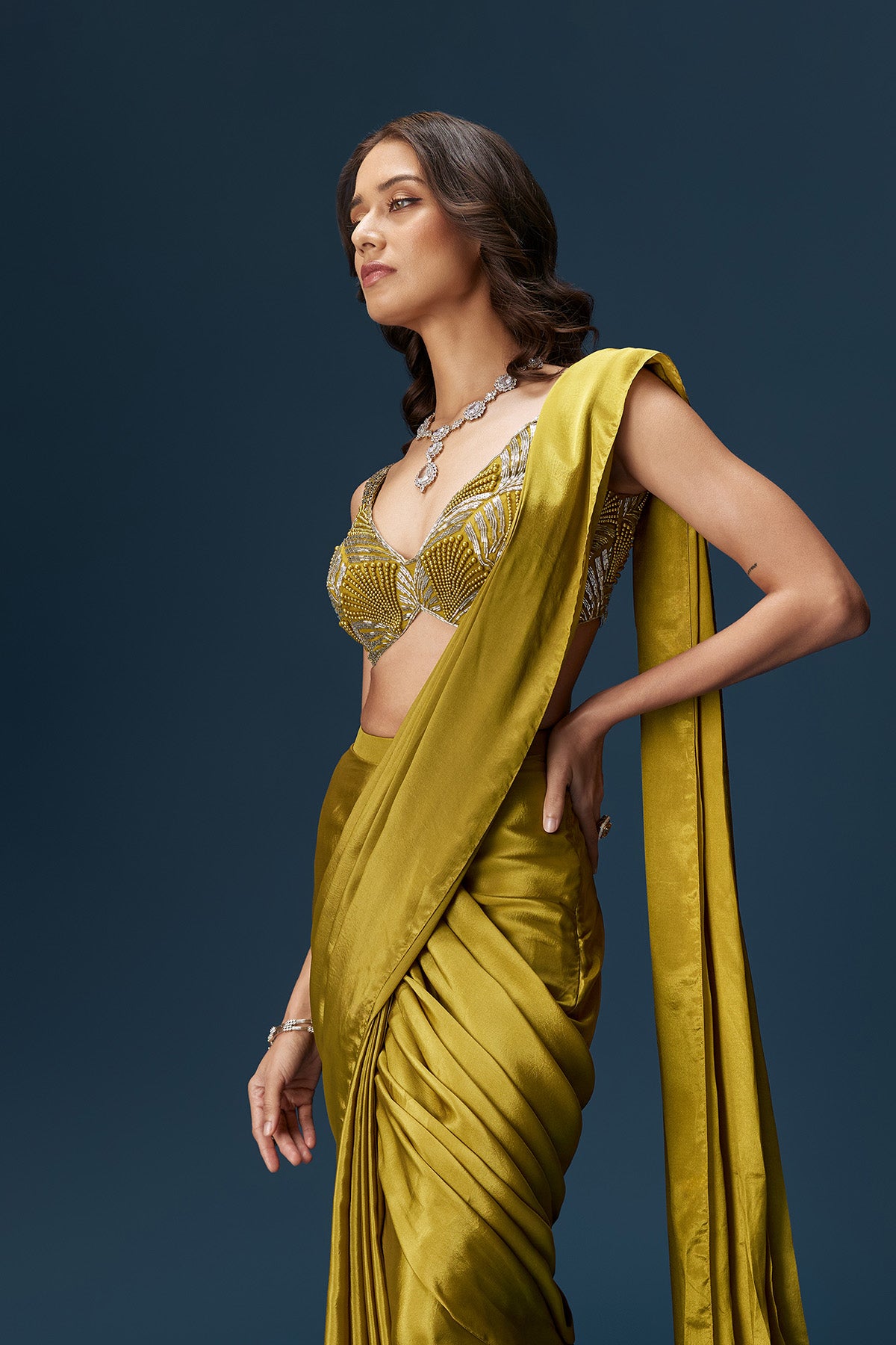 Green Drape Saree With V Neck Blouse And Belt