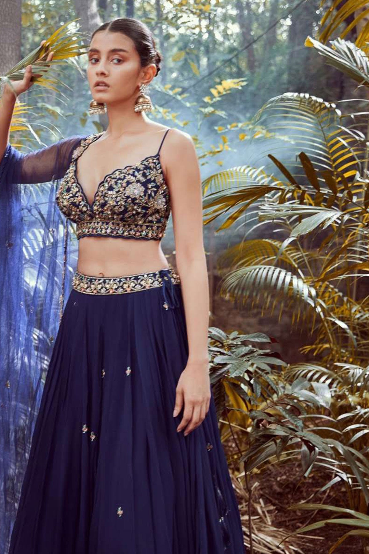 Blue Blood Lehenga Choli With Hand Embroidered Crop Top Using Sequins And Beads In Floral Jaal Design