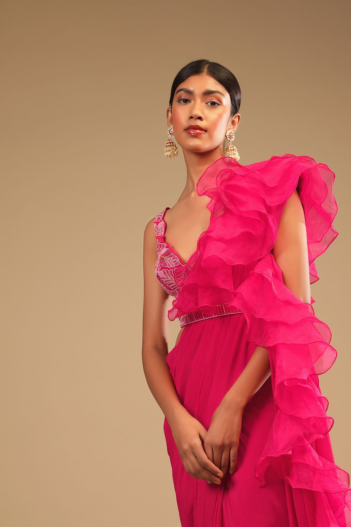 Hot Pink Readymade Saree In Crepe With Ruffle Frill On The Pallu And Beads Embroidered Crop Top And Belt