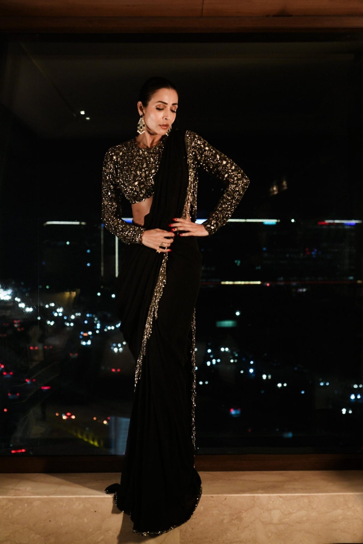 MALAIKA ARORA in Black Georgette Tassel Saree - Vvani